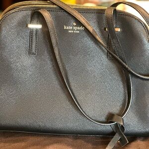 Black leather Kate Spade purse. New, without tags